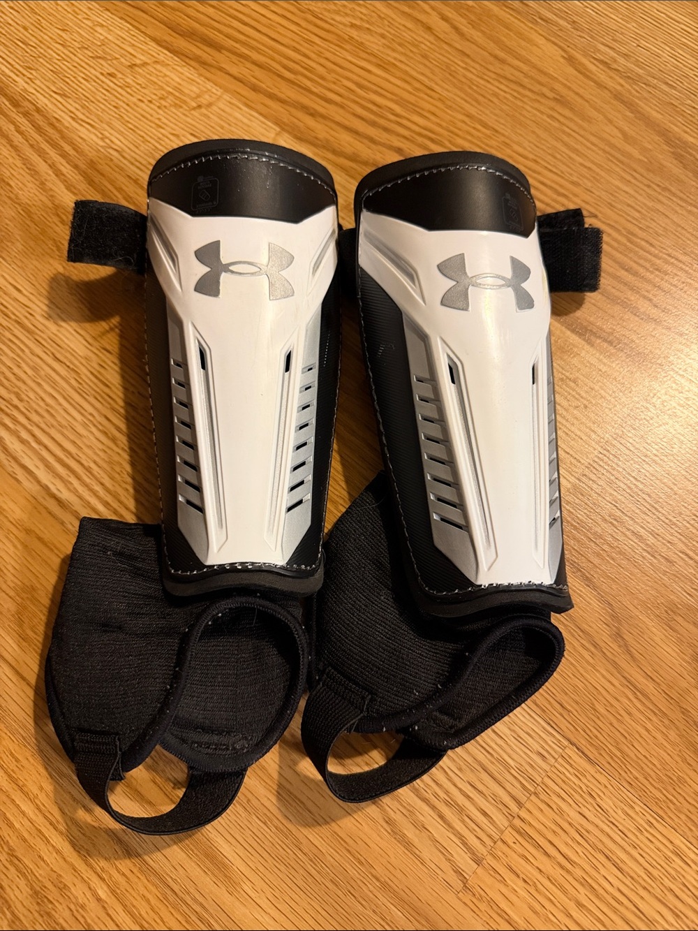 Under Armour White & Black Soccer Shin Guards with Straps kids